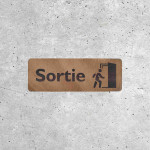 Panneau de sortie en bois avec pictogramme de porte